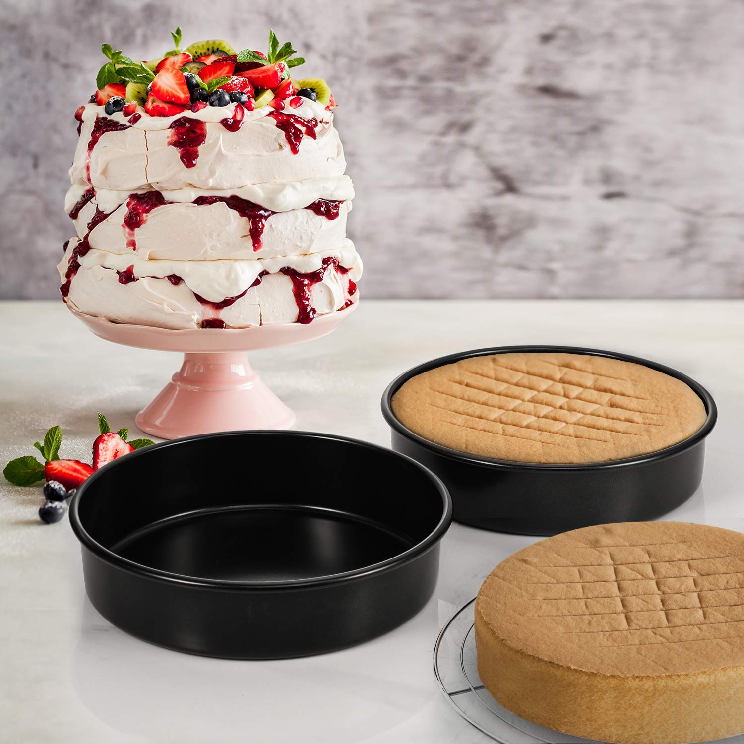 HIWARE straight-sided design helps create level layers for cakes and pies.