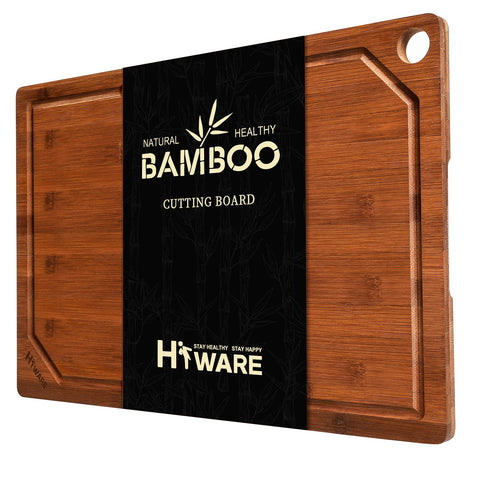 Hiware wood cutting board with juice groove for mess-free prep and easy slicing.