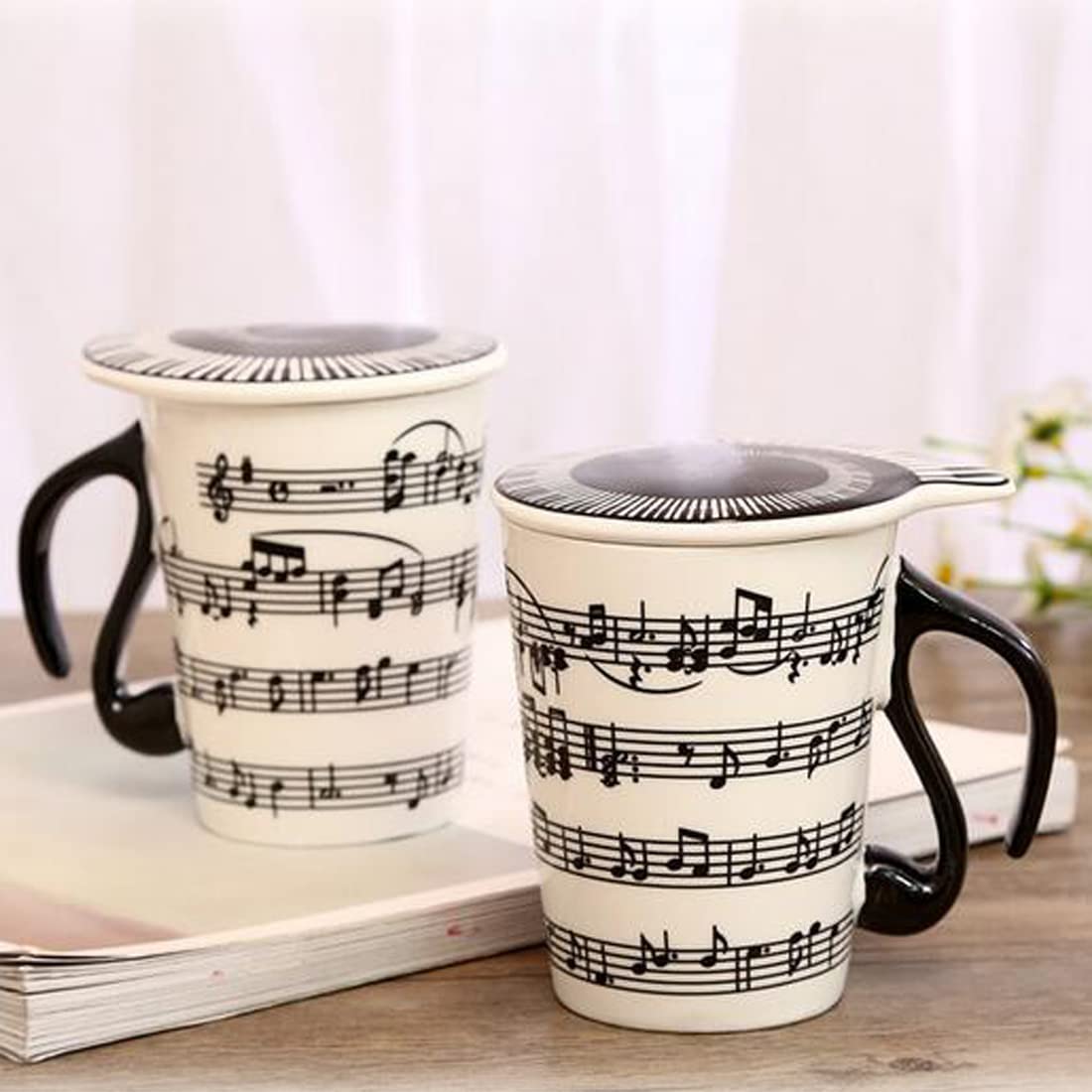 HLJgift mug lid with spiral keyboard detail for stylish hot beverages.