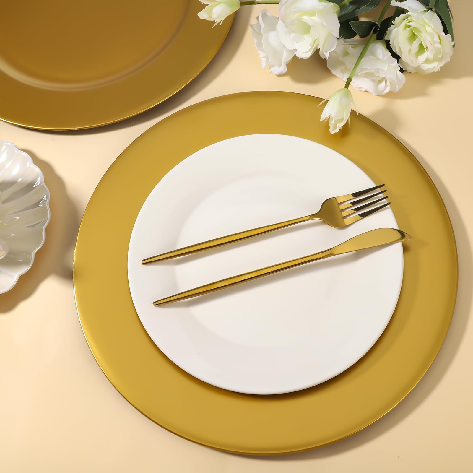 Hoemwarm 13-inch gold charger plates create stylish table settings.