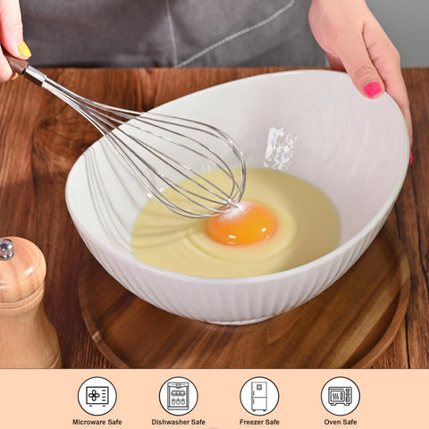 Hoilse deep oval bowl with wide rim designed to minimize splatter during tossing.