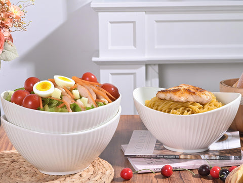 Hoilse entertaining-ready bowl displayed with a party setup and fresh fruit.