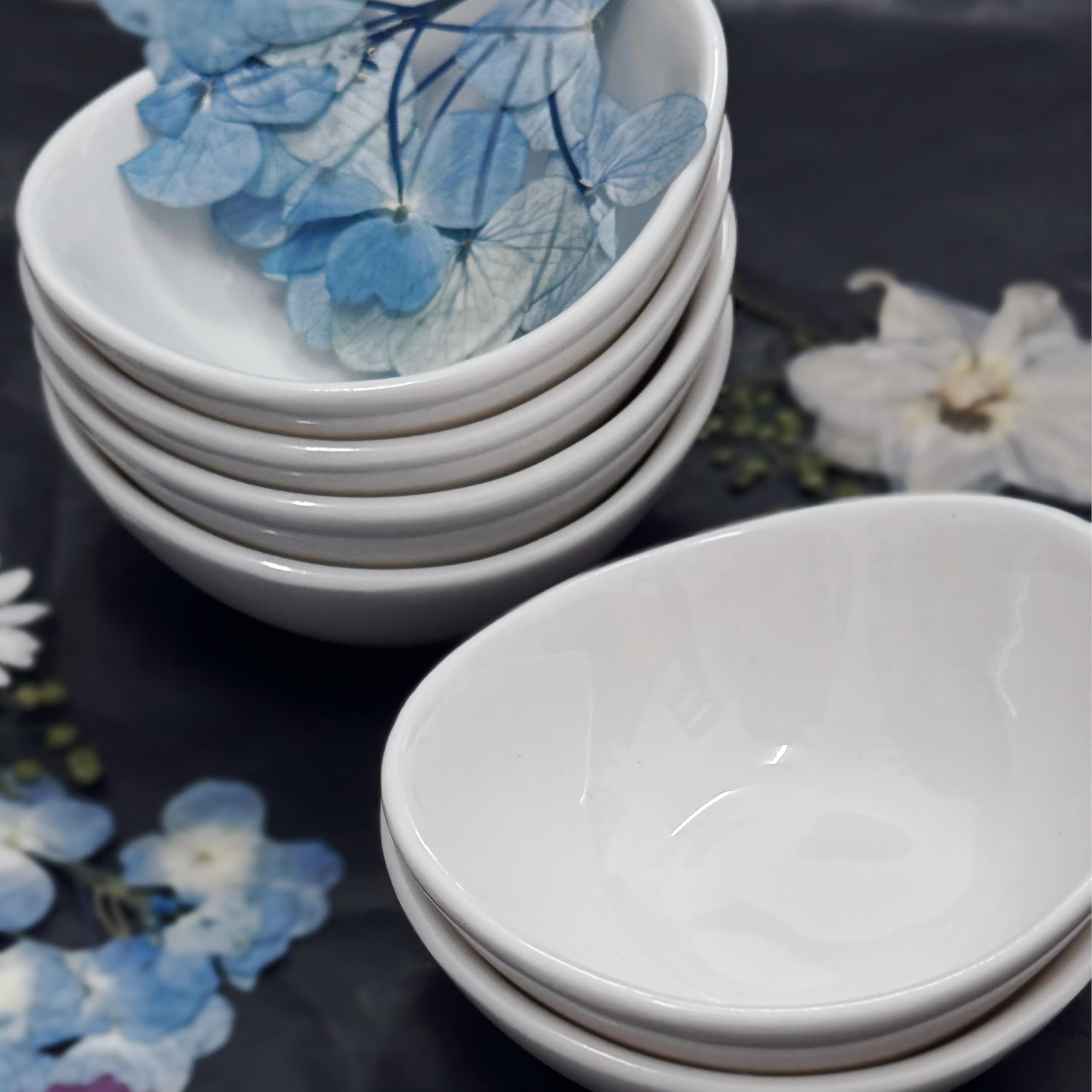 Holitika bowls feature an artistic shape that enhances table presentation
