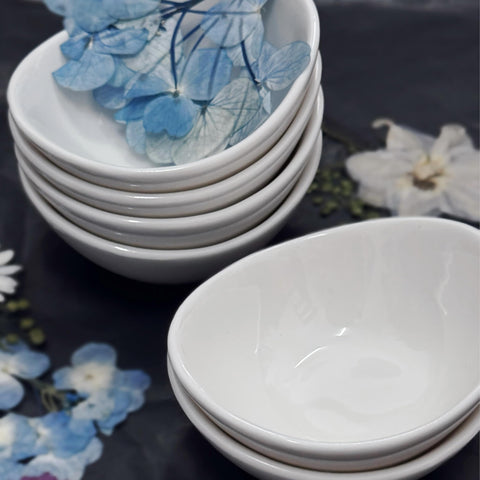 Holitika bowls feature an artistic shape that enhances table presentation