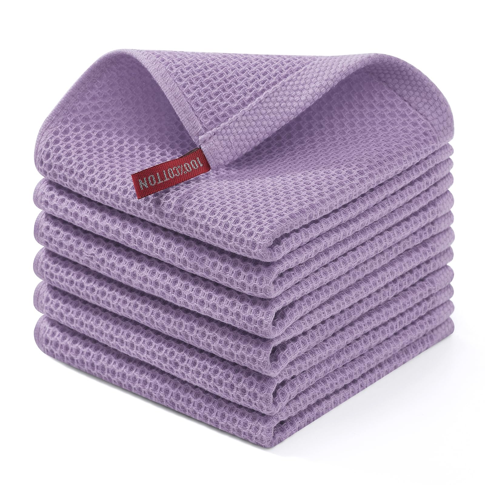 Homaxy lavender cotton waffle dishcloth in use for drying cookware and glassware.