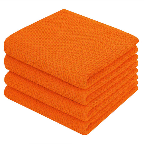 Homaxy orange waffle weave dish towels on counter for quick drying.