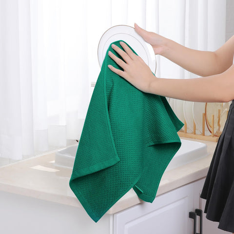 Homaxy four-pack of dish towels neatly stacked for versatile kitchen decor.