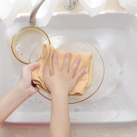 Homaxy apricot solid color dish towels coordinate with kitchen decor for a cohesive look.