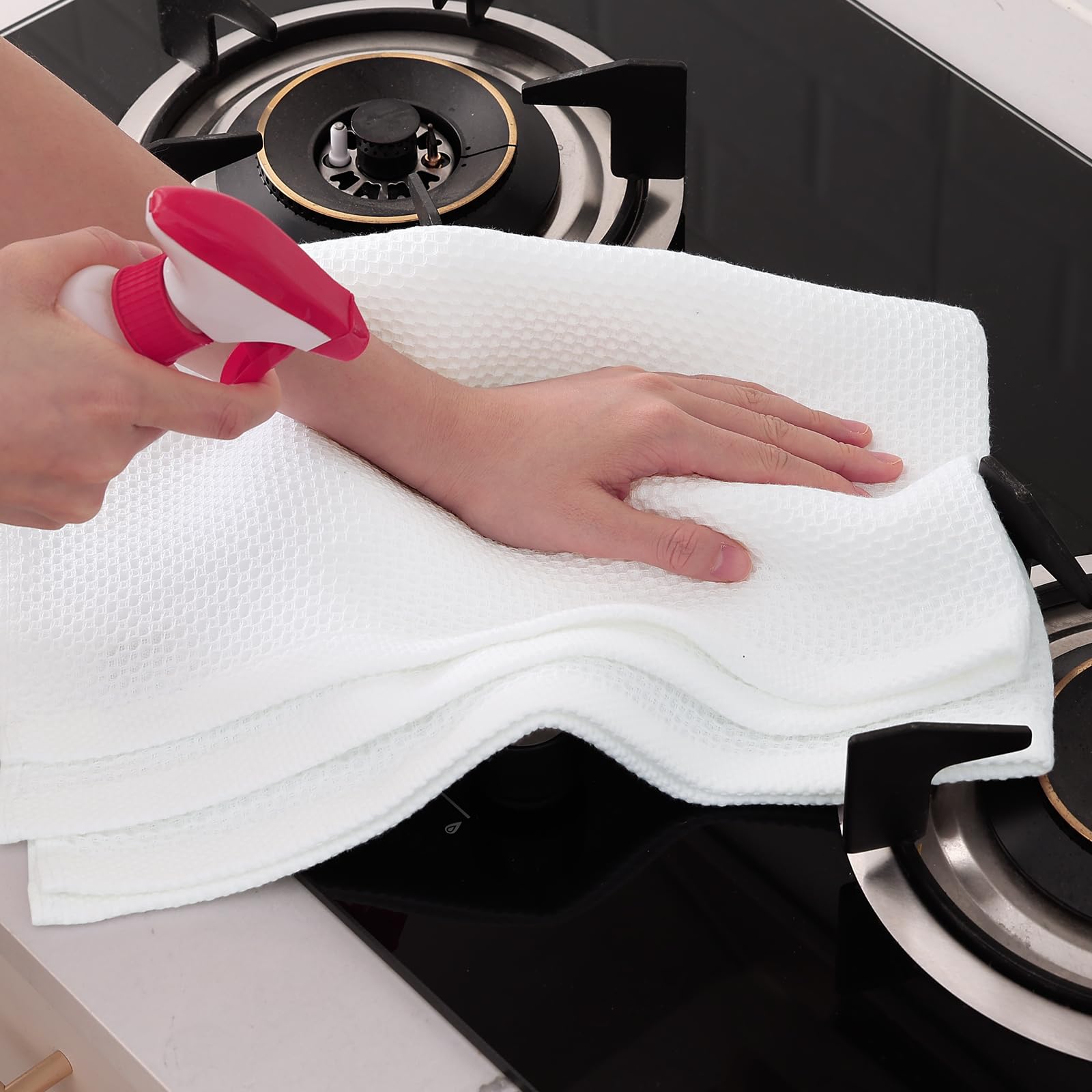 Homaxy towels in use in a kitchen demonstrate versatile cleaning and drying.