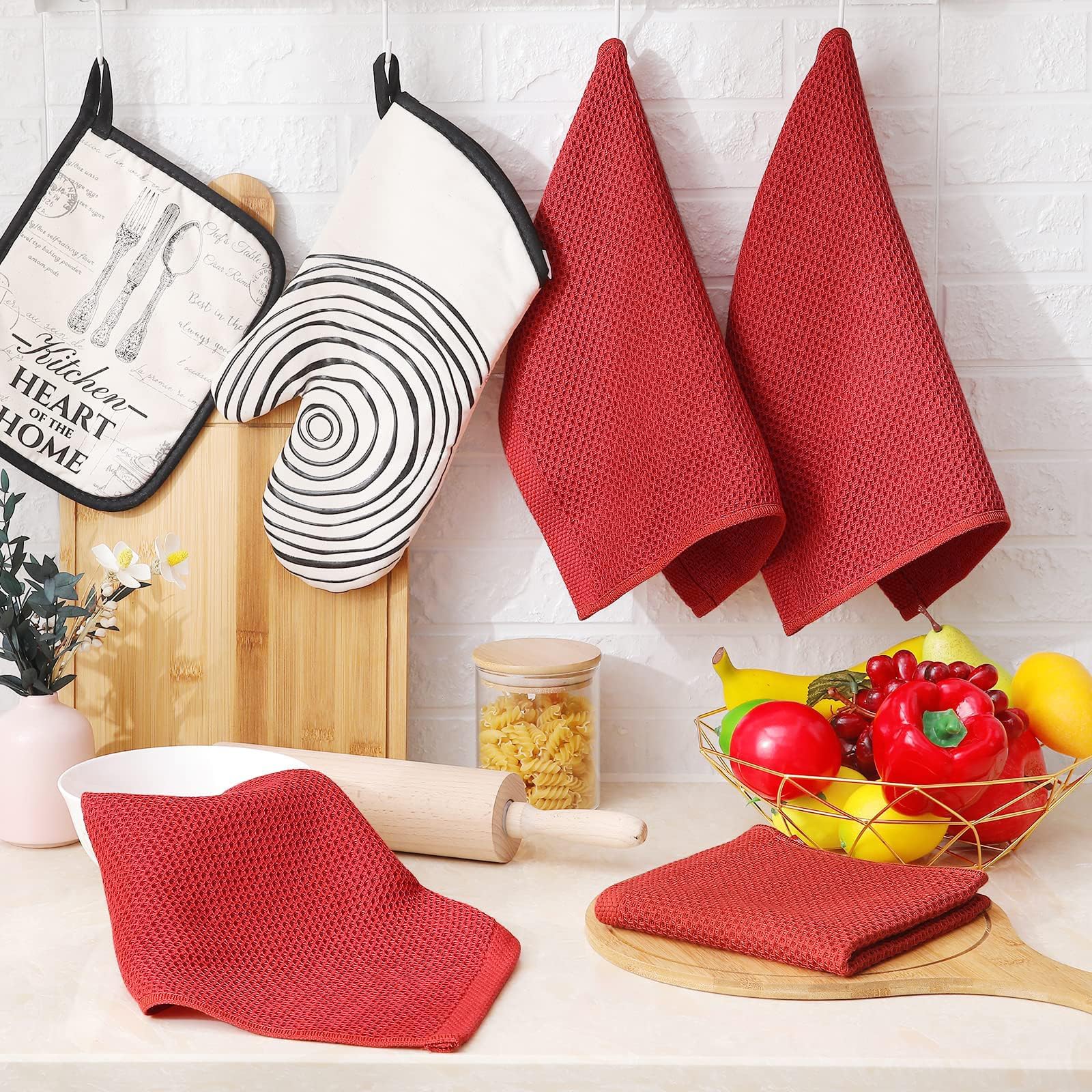 Homaxy kitchen towels used to wipe spills and dry dishes.