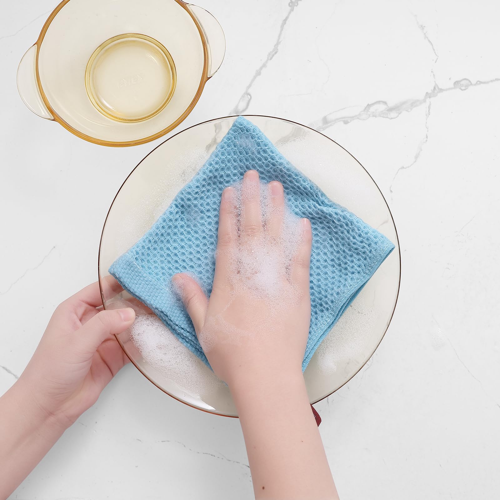 Homaxy sky blue dishcloth in kitchen drawer.