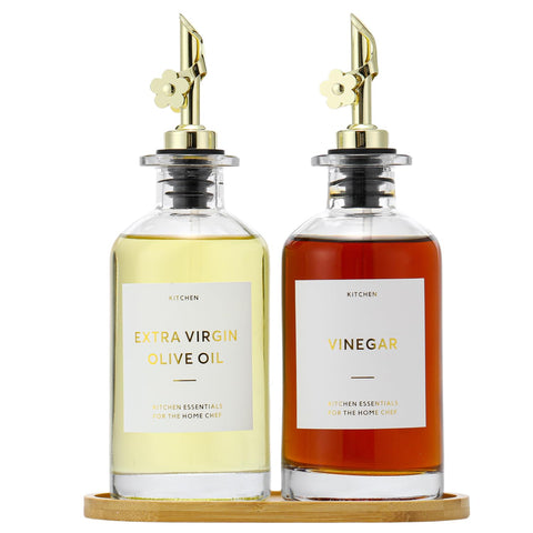 HOMCDALY olive oil dispenser bottles in a 2-pack for organized cooking on the counter