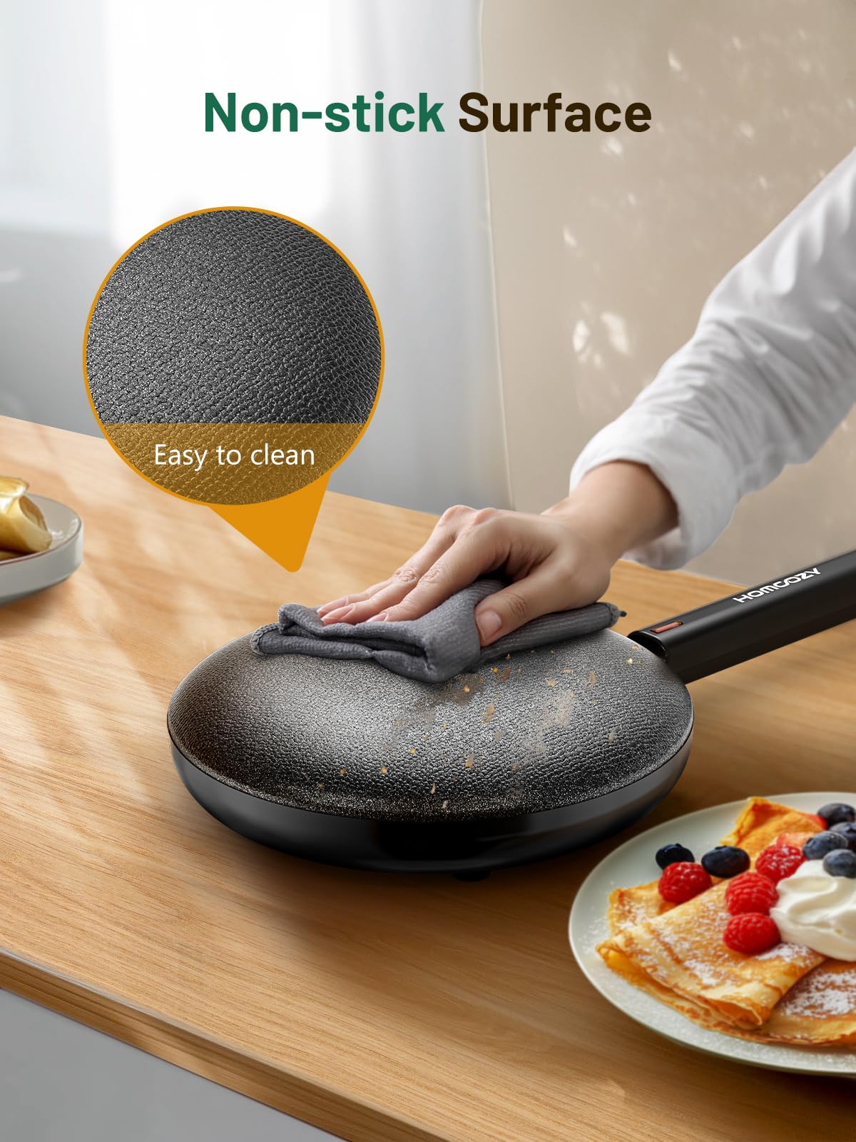 HomCozy crepe maker nonstick coating close-up for easy release and cleanup.