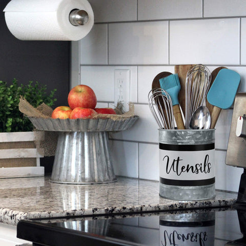 Home Acre Designs farmhouse utensil caddy on counter enhances style.