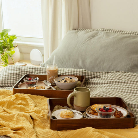 Acacia wood tray on a coffee table adds rustic-modern decor