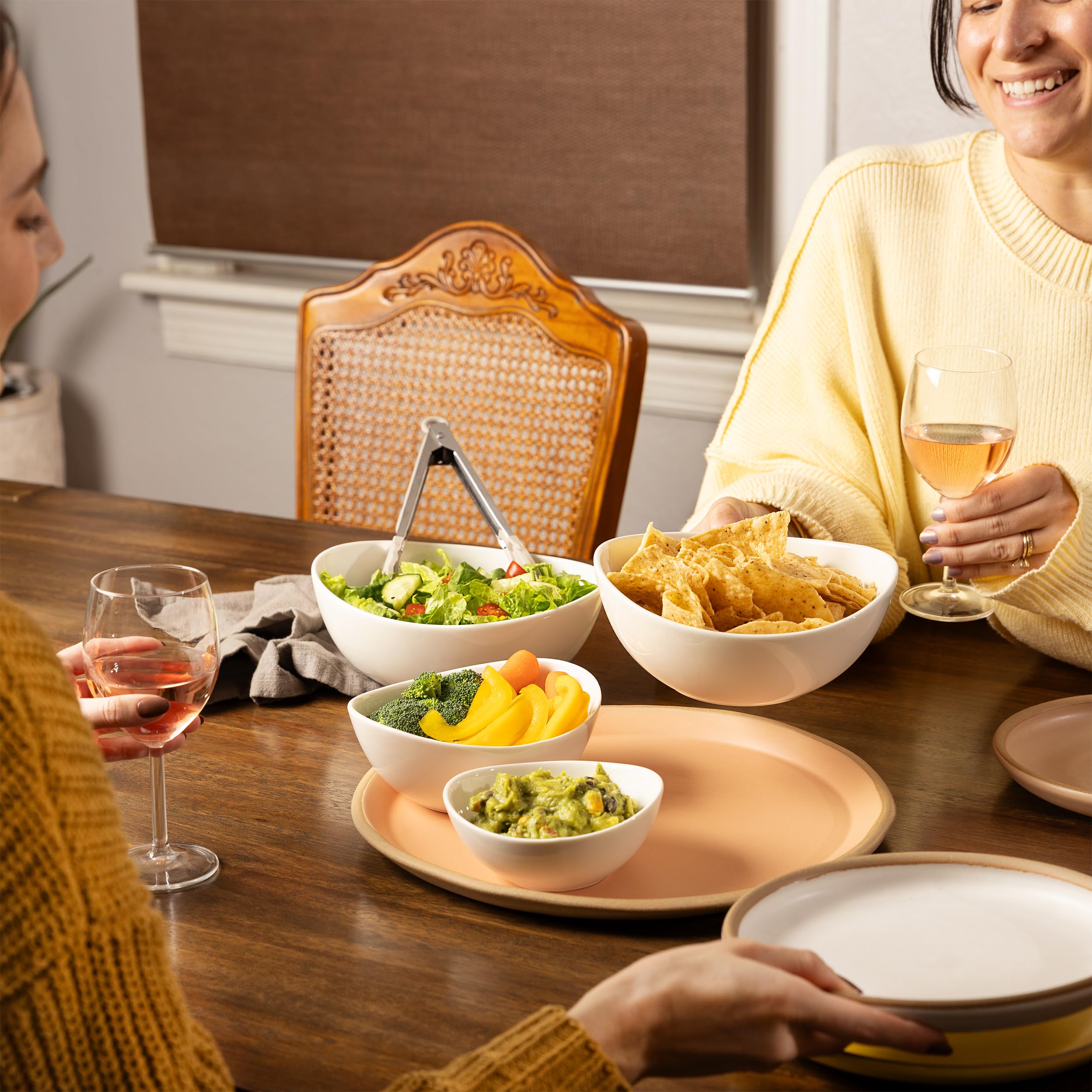 Home Beets glossy white ceramic tableware enhances any table setting.