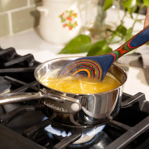 Home Beets Pakka wood utensils with blue rainbow finish, comfortable long-handled grip.