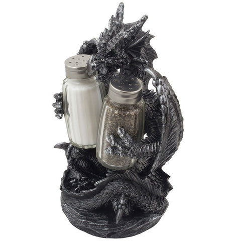 Home 'n Gifts glass salt and pepper shakers shine within dragon-themed display.