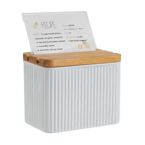 HOME PALETTE recipe box with white vertical stripes keeps recipes organized on the counter.