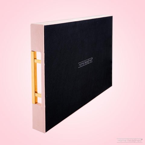 Home Redefined bar display tray keeps glassware organized with elegance.