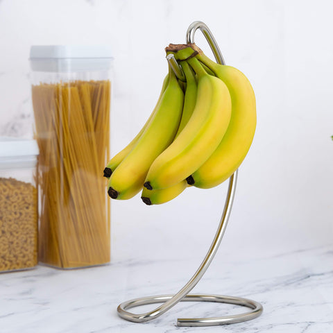 Homeries banana tree hanger satin nickel enhances kitchen decor while organizing fruit.