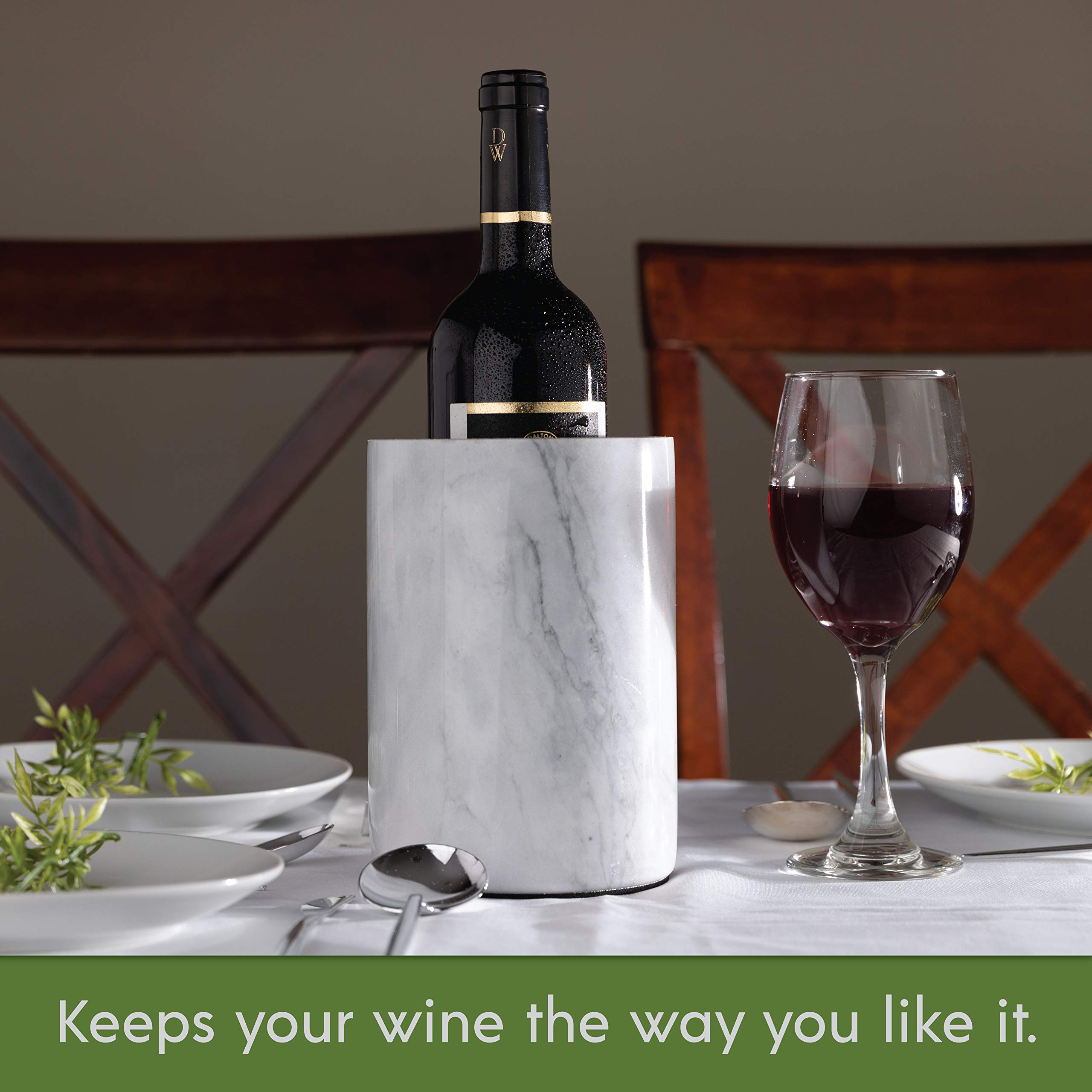 Homeries marble wine chiller bucket on kitchen counter with decor items
