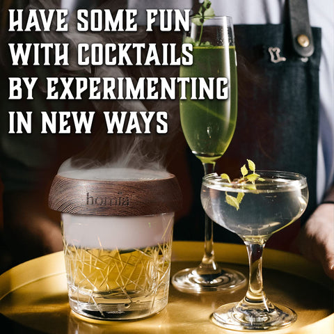Homia bar spoon and pourers enable smooth pours and stirring.