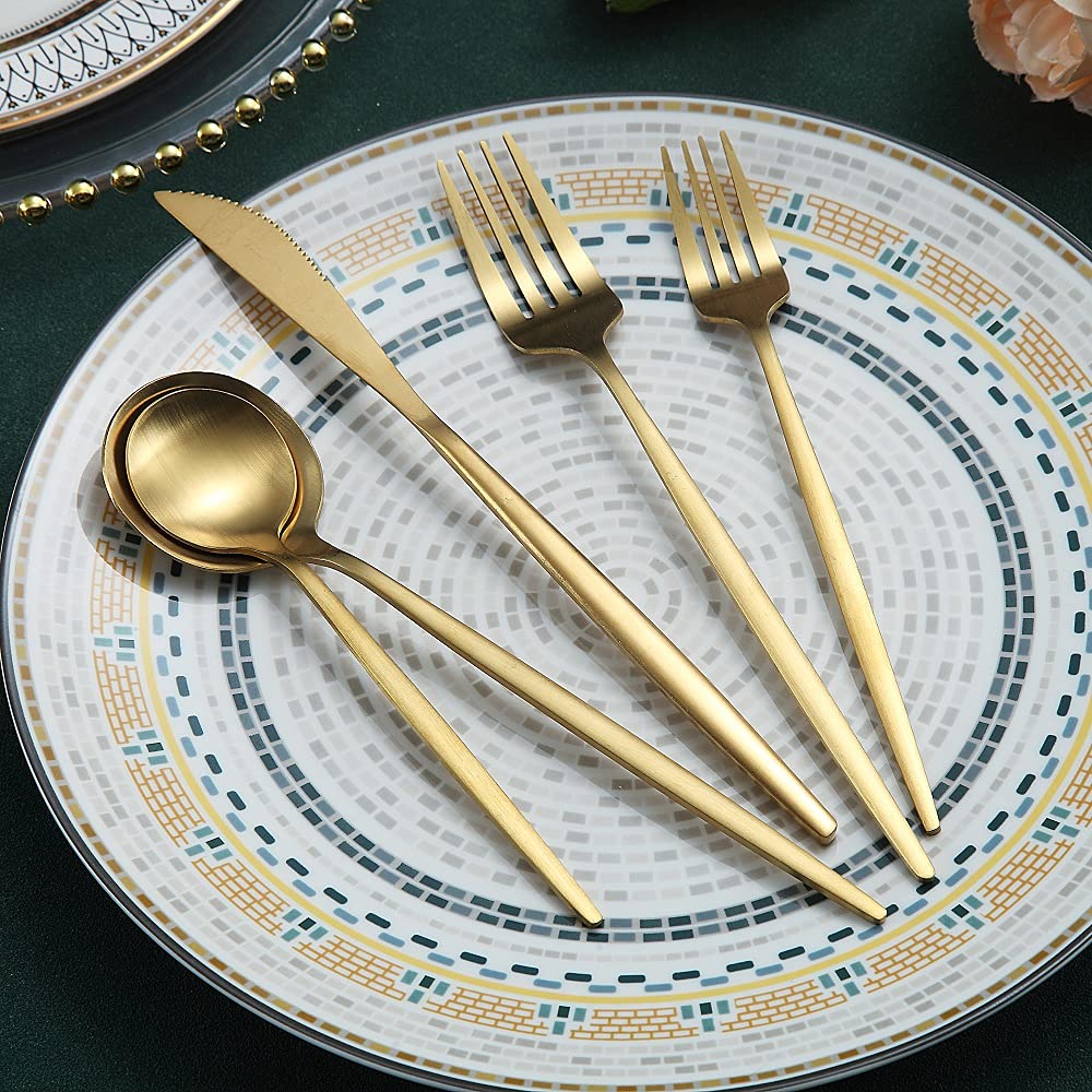 HOMQUEN matte gold silverware on a bright table setting portrays premium tableware.