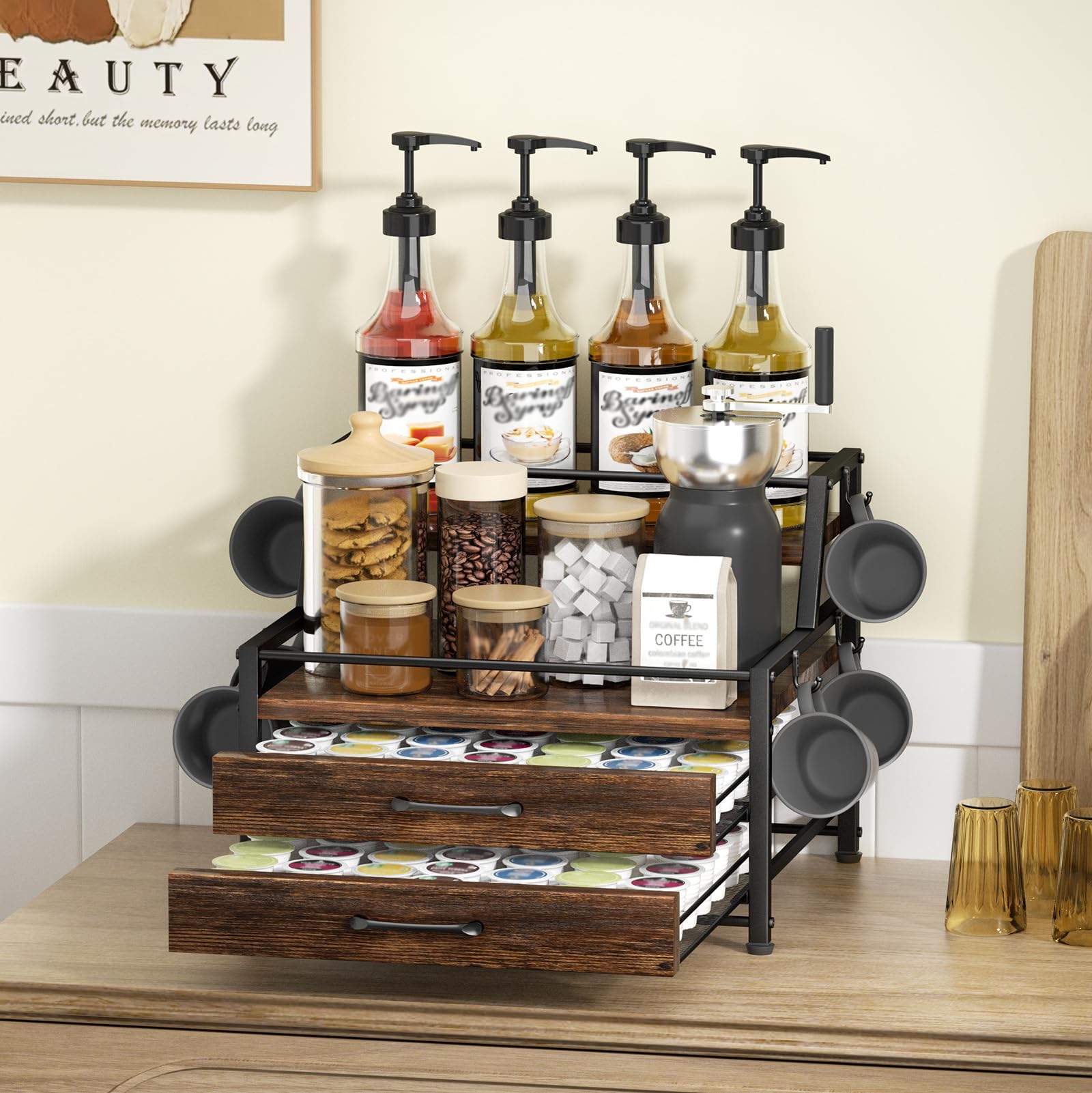 Homsorout top-tier display with syrup bottles and nearby coffee pods