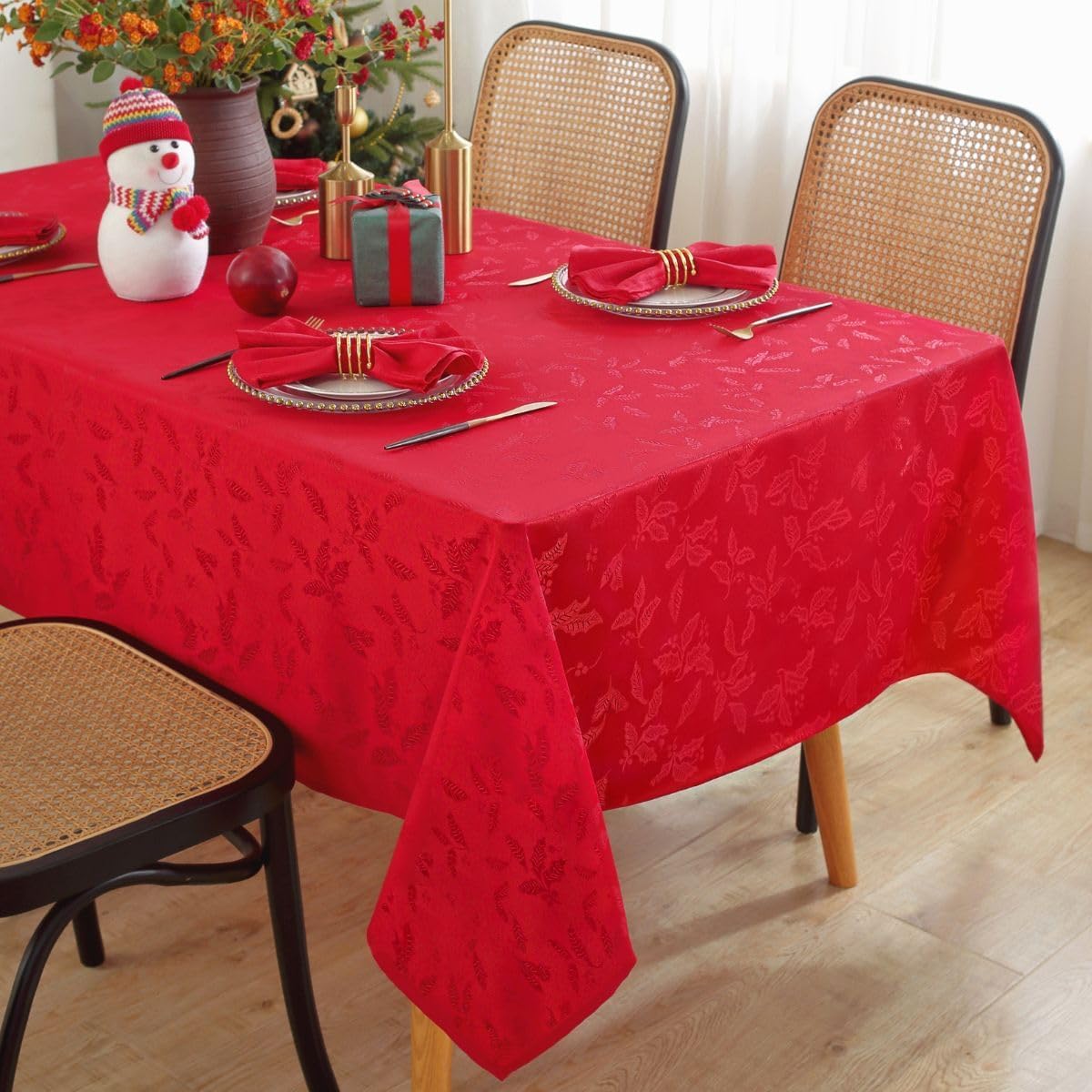 Honellaty rectangle red tablecloth with holly berry pattern enhances festive table decor.