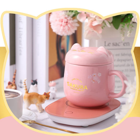 Honeydak stainless steel spoon accompanies the mug warmer for stirring.