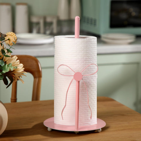 Honeydak pink bow paper towel holder in bathroom with rust-resistant finish for humidity.