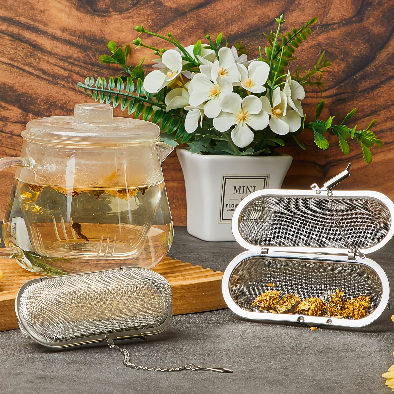 Hoolerry long-chain tea filter hangs on pots for easy removal.