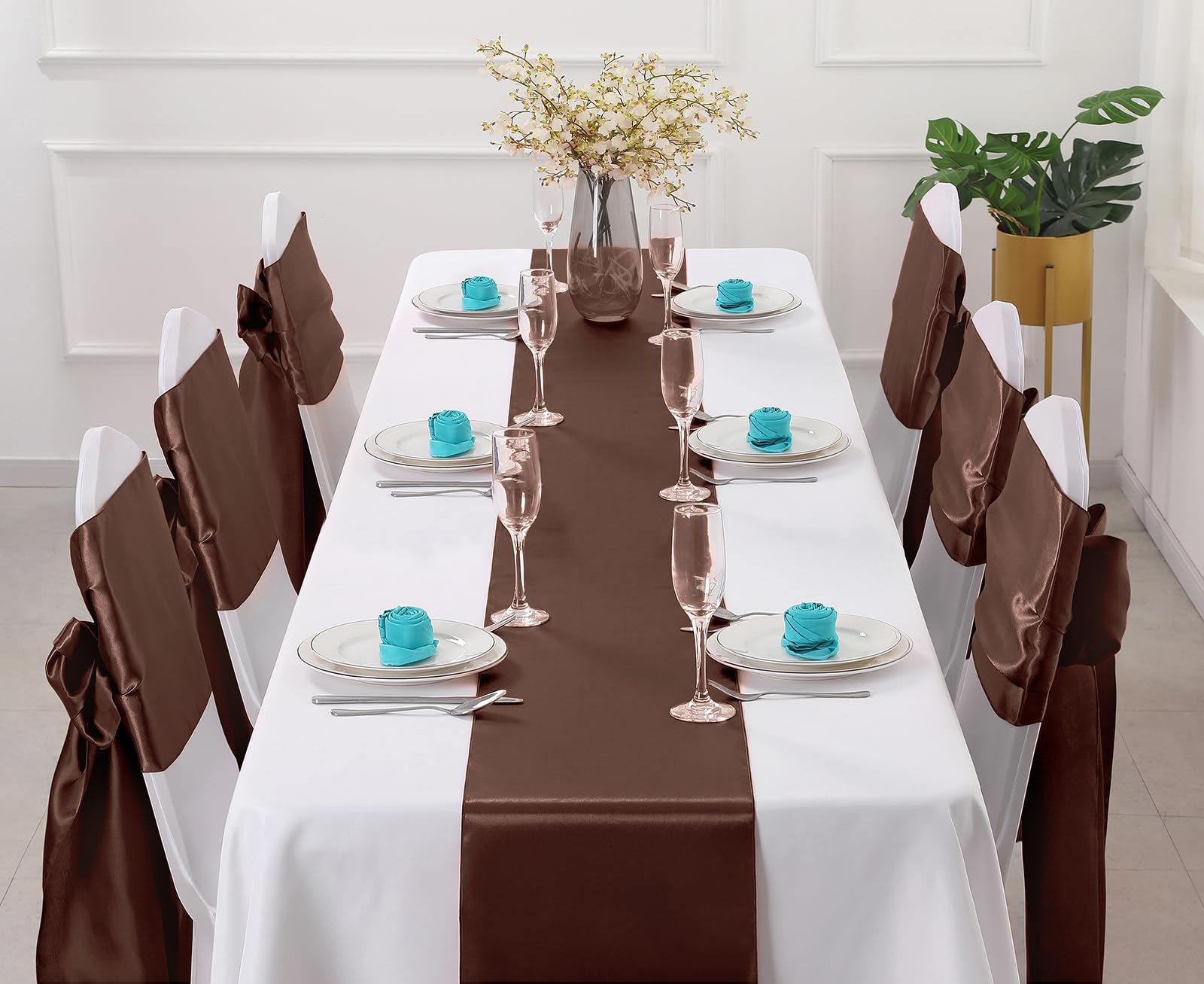 Horbaunal wedding table runner drape enhances banquet décor with luxurious satin finish.