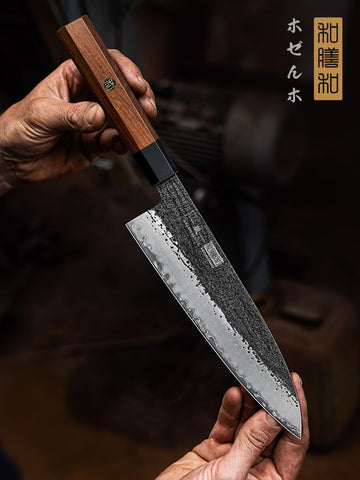 HOSHANHO blade shows nine-layer pattern, signaling craftsmanship and durability.