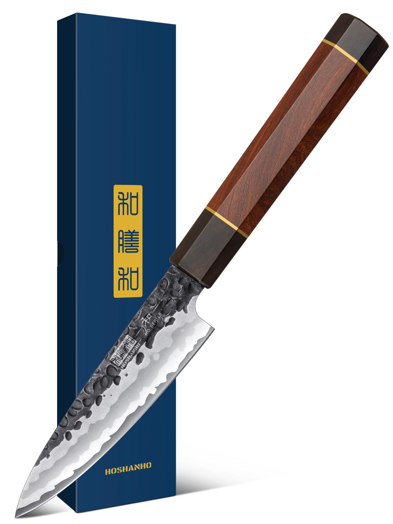 HOSHANHO paring knife with narrow edge for precise fruit peeling.