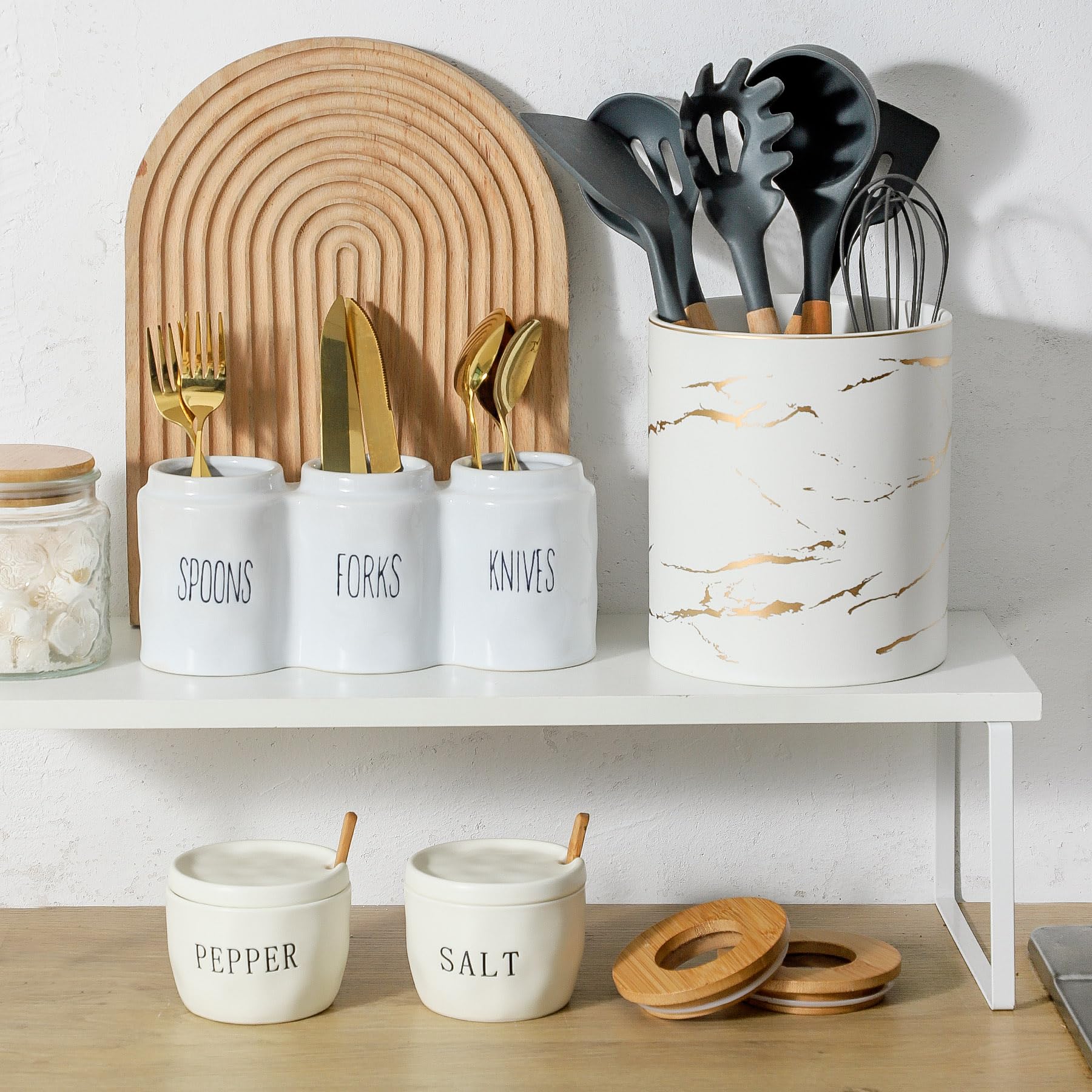 Howise salt pepper bowls with lids and spoon storage solution.