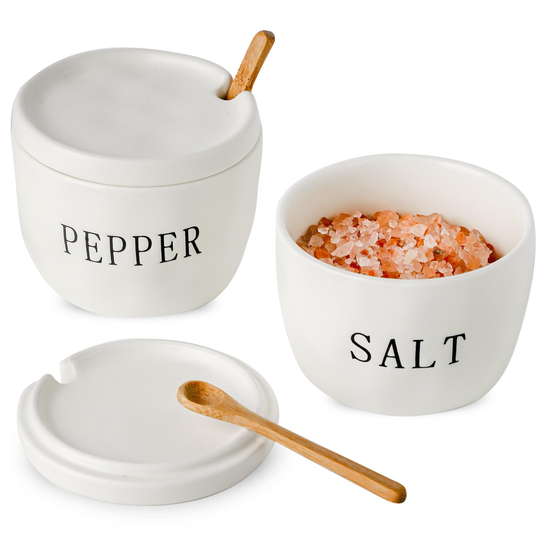 Howise salt and pepper bowls with lids on the counter for easy seasoning.