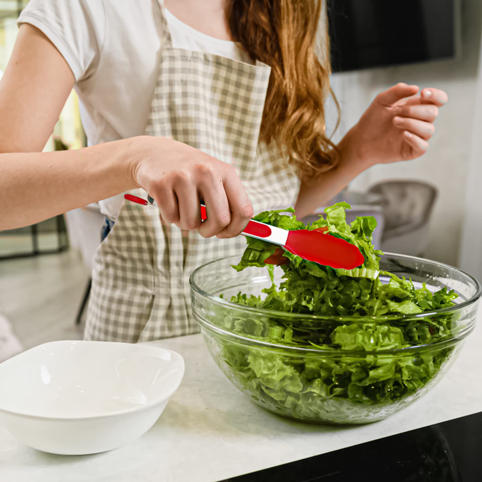 HST red handle adds bright style to your kitchen toolkit.