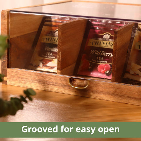HTB acacia wood tea storage on counter complements kitchen decor.