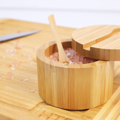 HTB bamboo salt cellar shows mini spoon stored in lid for precise sprinkling.