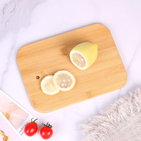 HTB natural bamboo surface that helps keep knives sharp and scenes tidy.