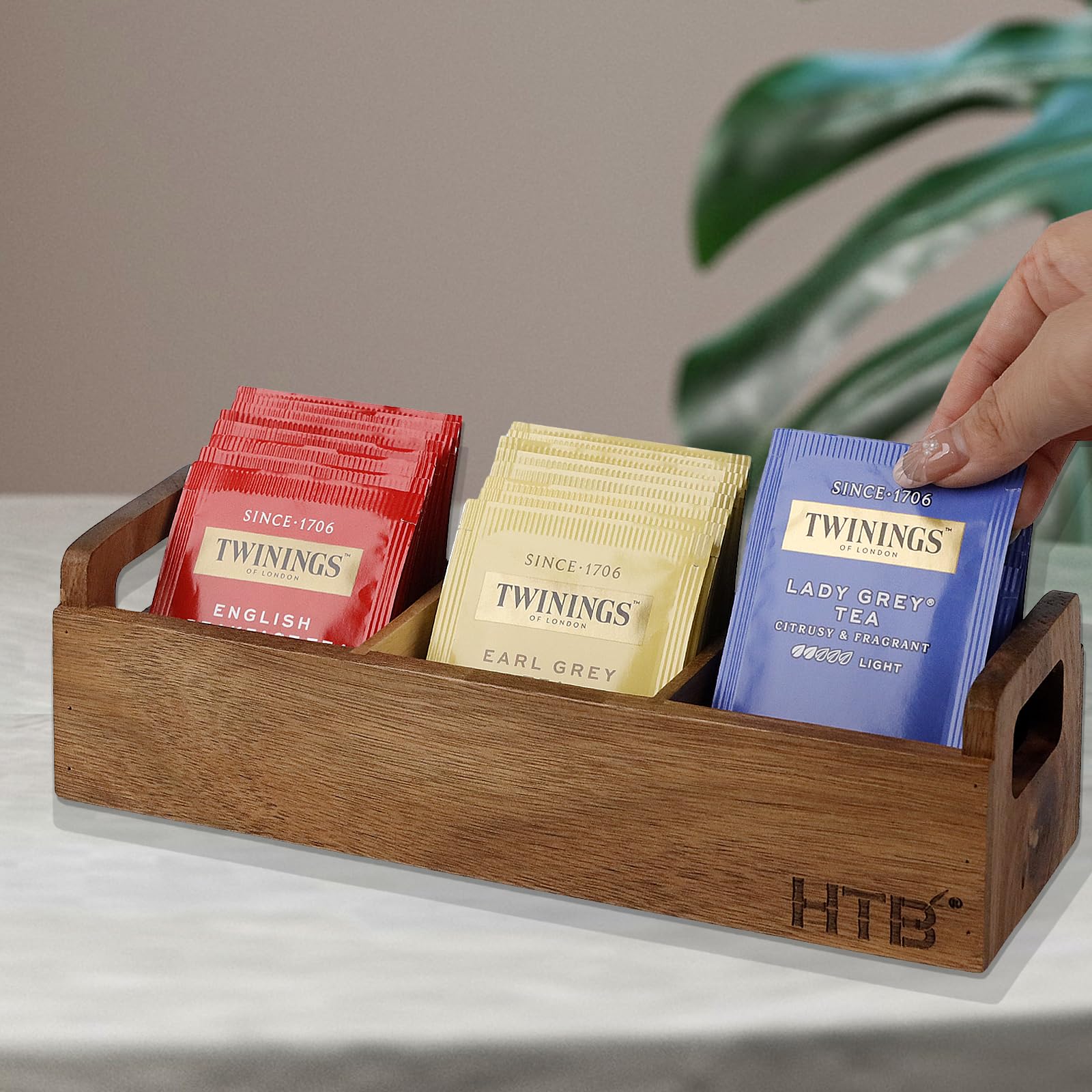 HTB natural wood tea box shows grain patterns while organizing essentials.