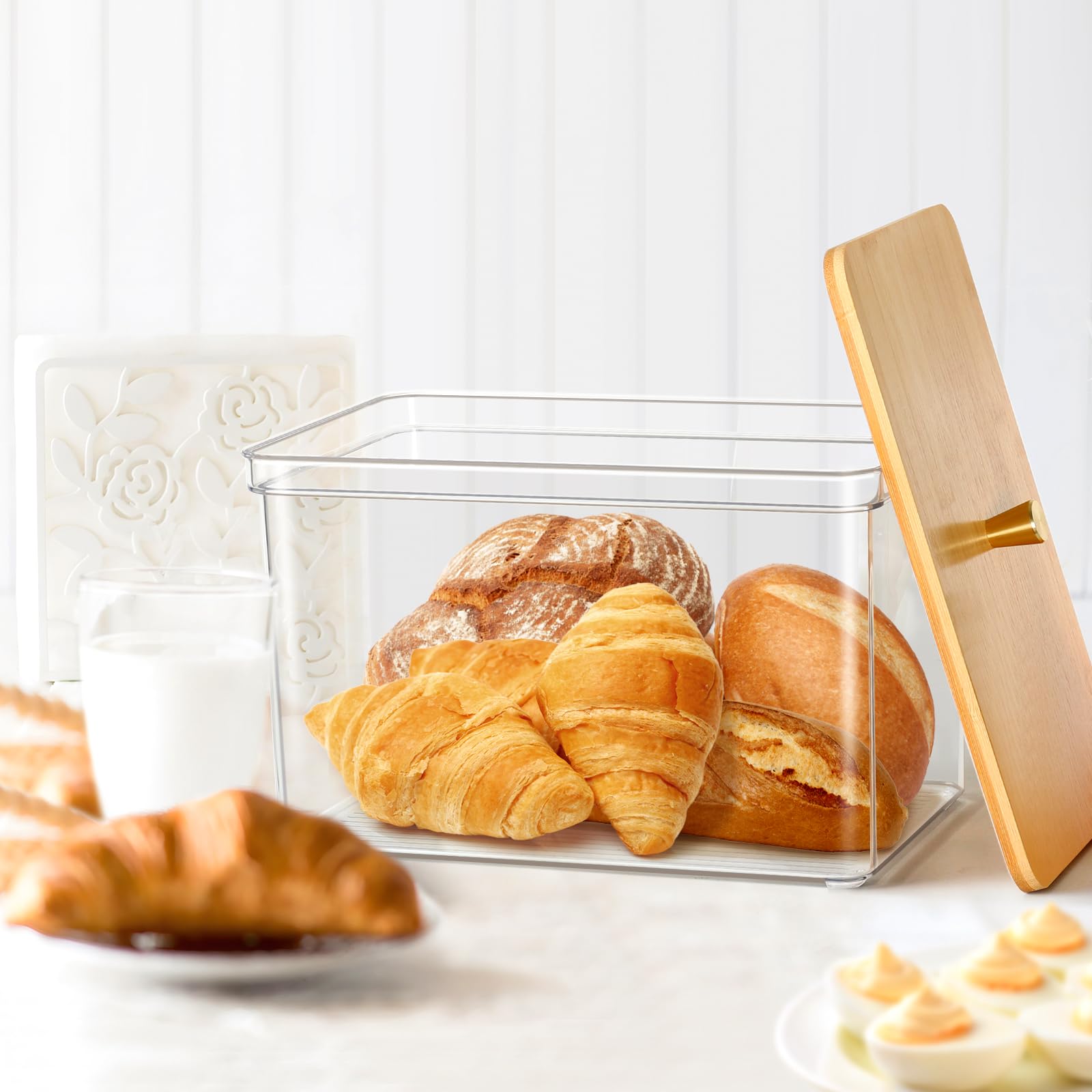 Hudgan breadbox interior capacity demonstrated with loaf and pastries