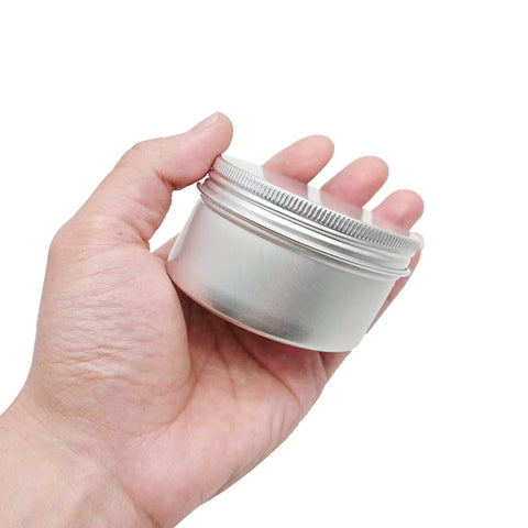 Six-ounce Hulless tin stacked to demonstrate uniform storage size.