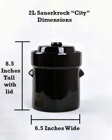 Batch of sauerkraut fermenting in Humble House crock, showcasing easy setup.