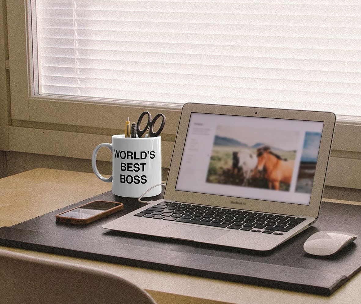 HUOZHI mug on a desk adds personality during coffee breaks.