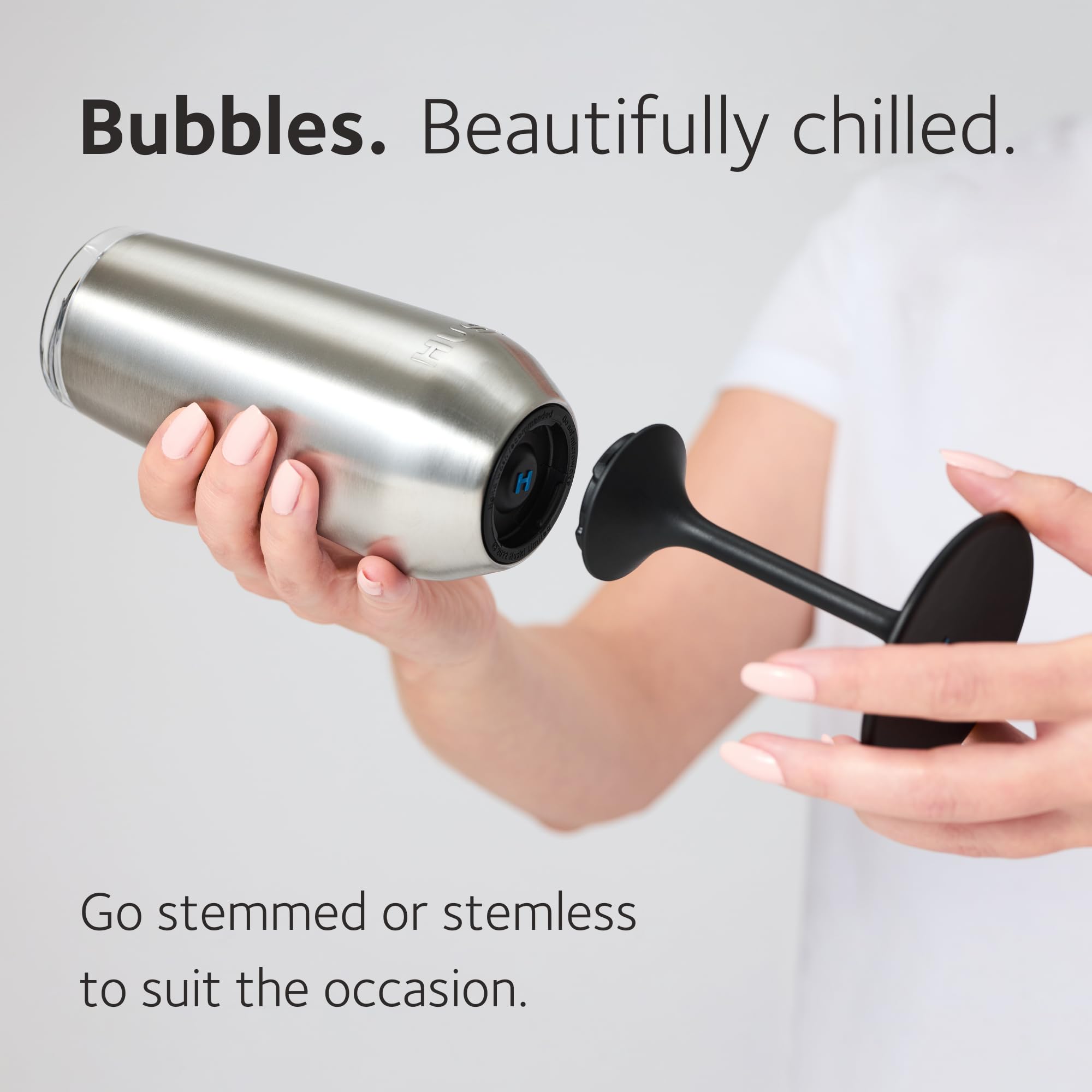 Huski champagne flute showing EasySlider Lid for splash-free pouring.