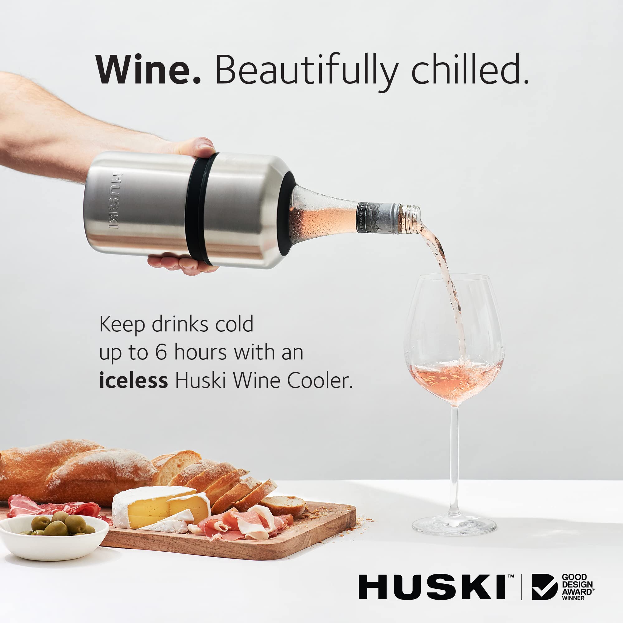 Huski Wine Chiller Pink bottle inside clamps securely for steady pouring