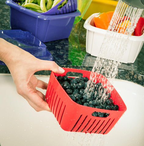 Hutzler Berry Keeper colander in use keeps berries dry after washing.